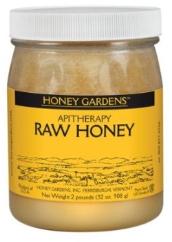 Raw honey in a glass bottle