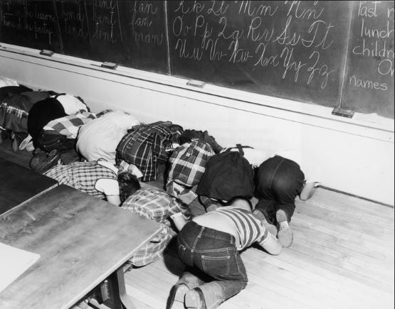 School kids learn how to take cover in the atomic age